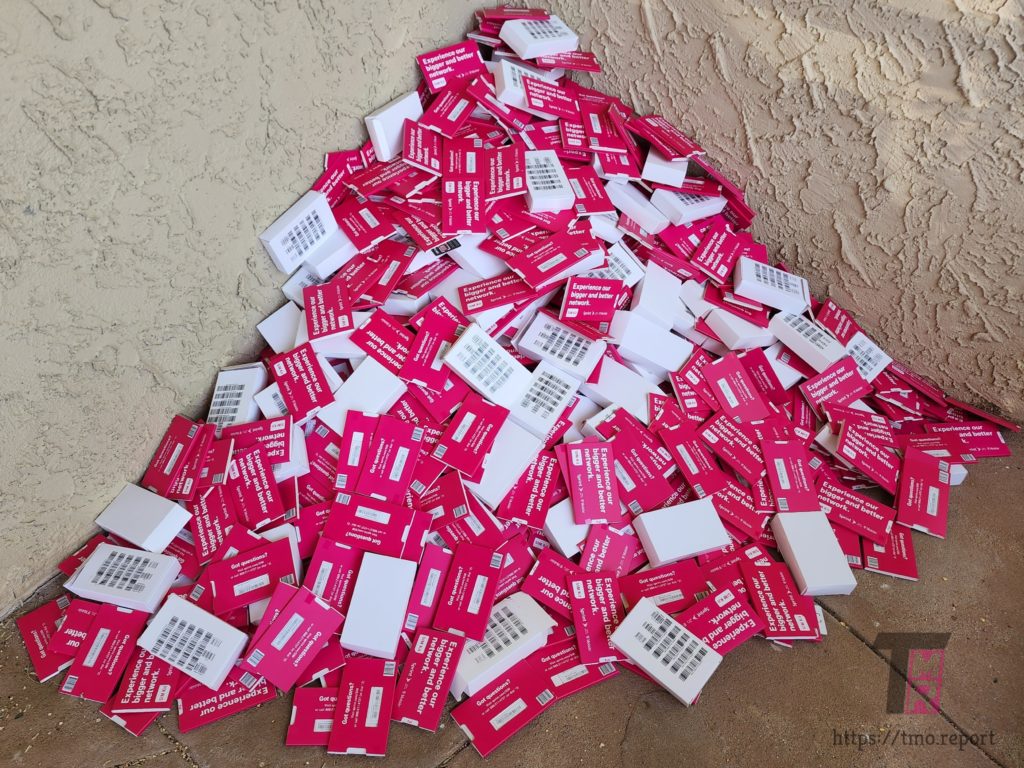 a pile of opened sim cards